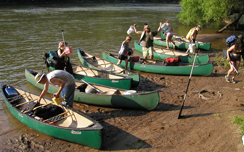 Group setting out in canoes
